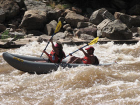 Inflatable kayaking in Cataract Canyon on Colorado River